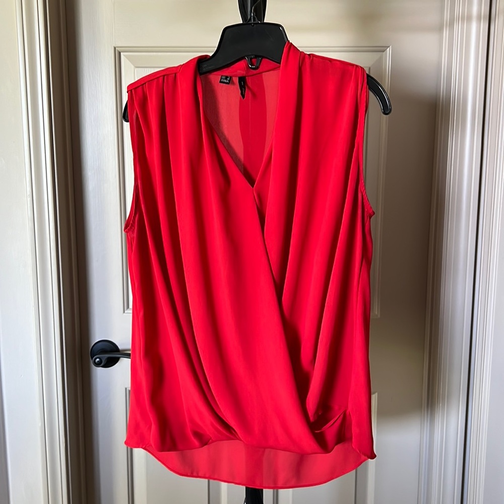 Red sleeveless top
